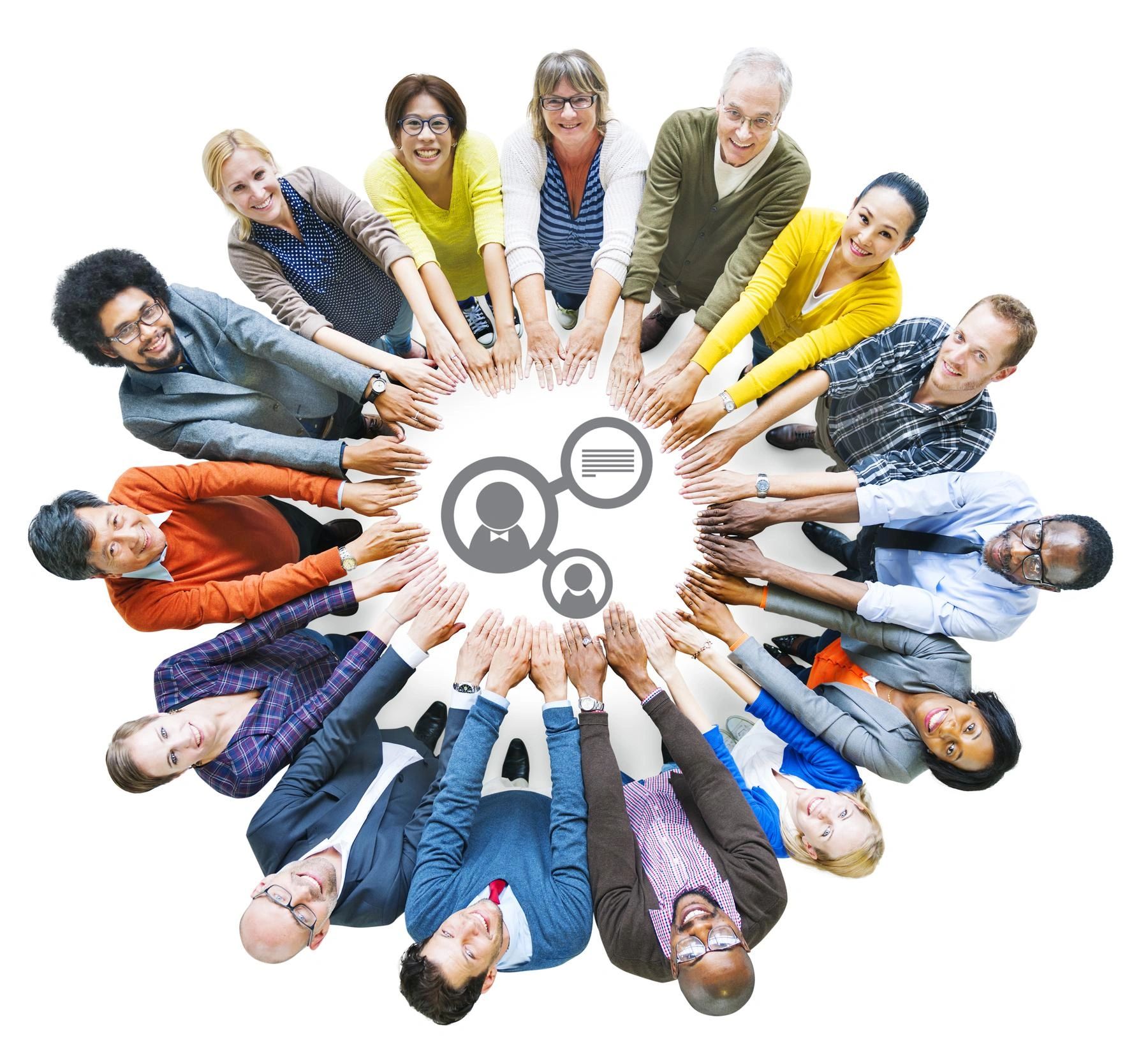 Diverse group of people with hands joined in a circle